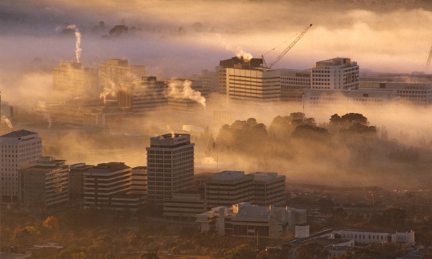Canberra, a pretty picture, with fog that doesn't hide enough. (The Guardian)
