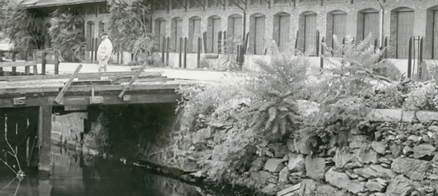 Rail Road Crossing Street Bridge, with Tefft warehouse in background. (providencejournal.com)